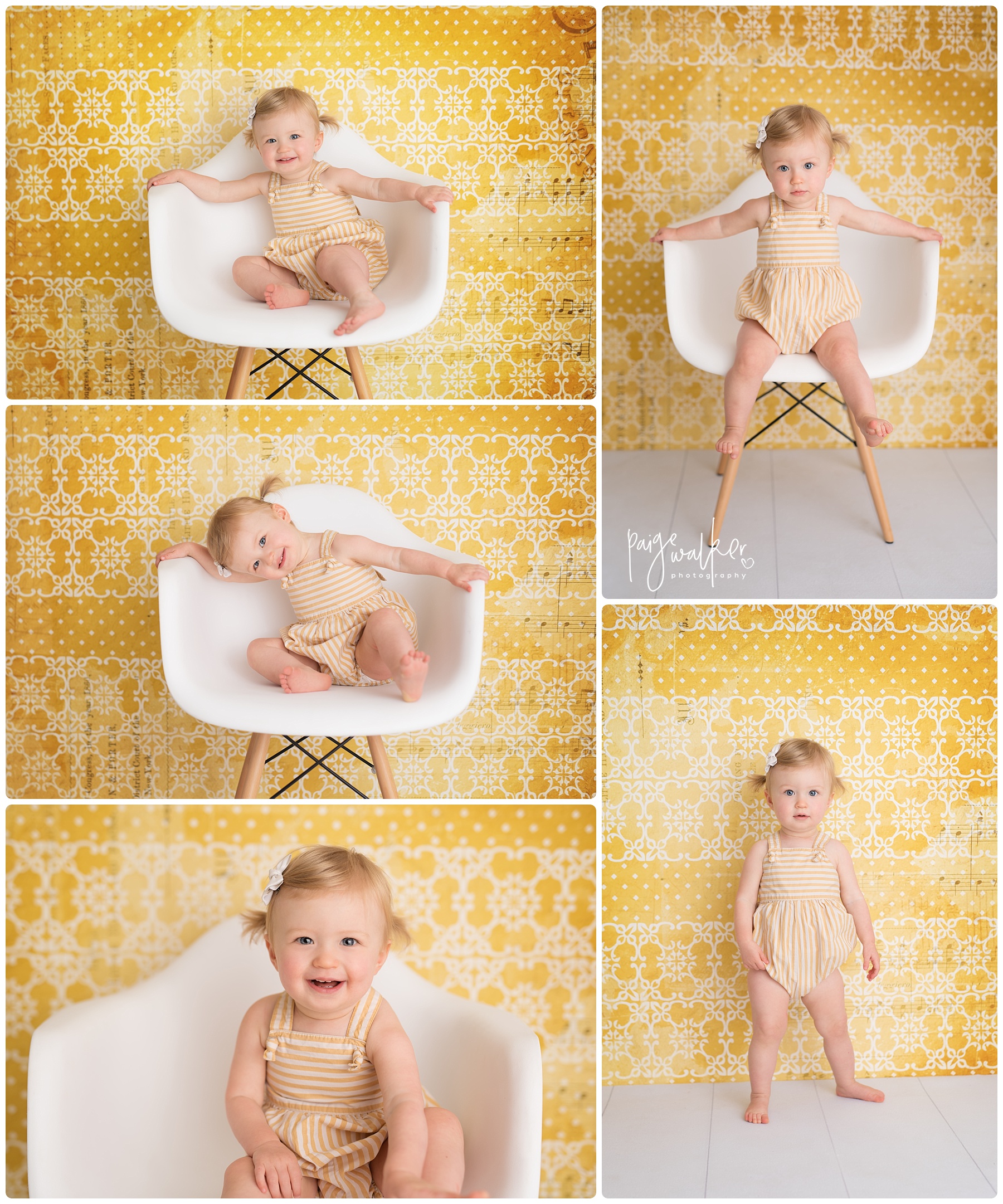 one year old girl playing in a white chair