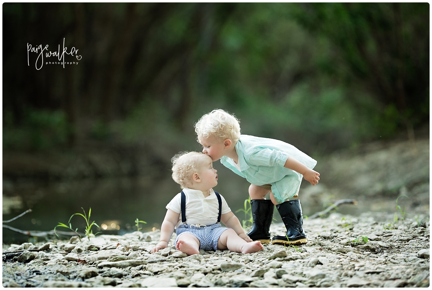 brothers kissing in the creek bed