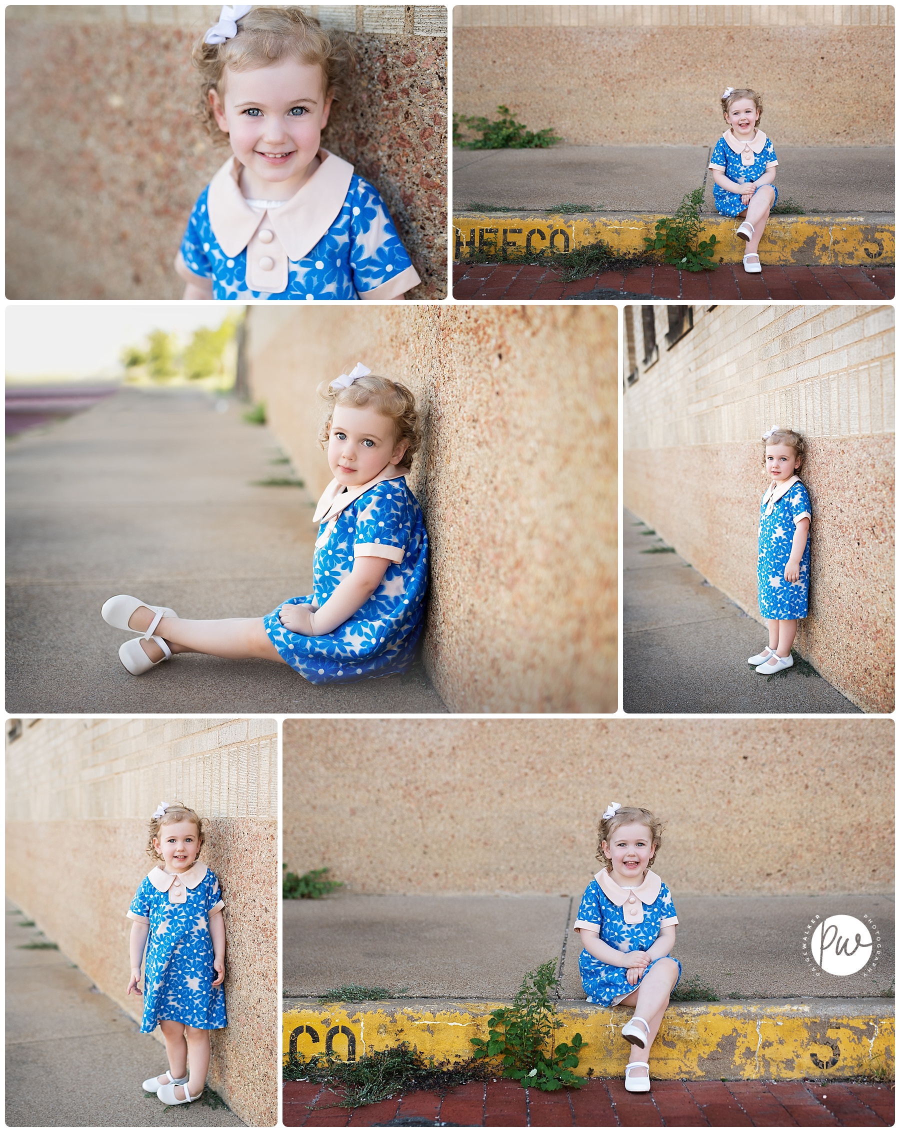 little girl leaning against a brick wall