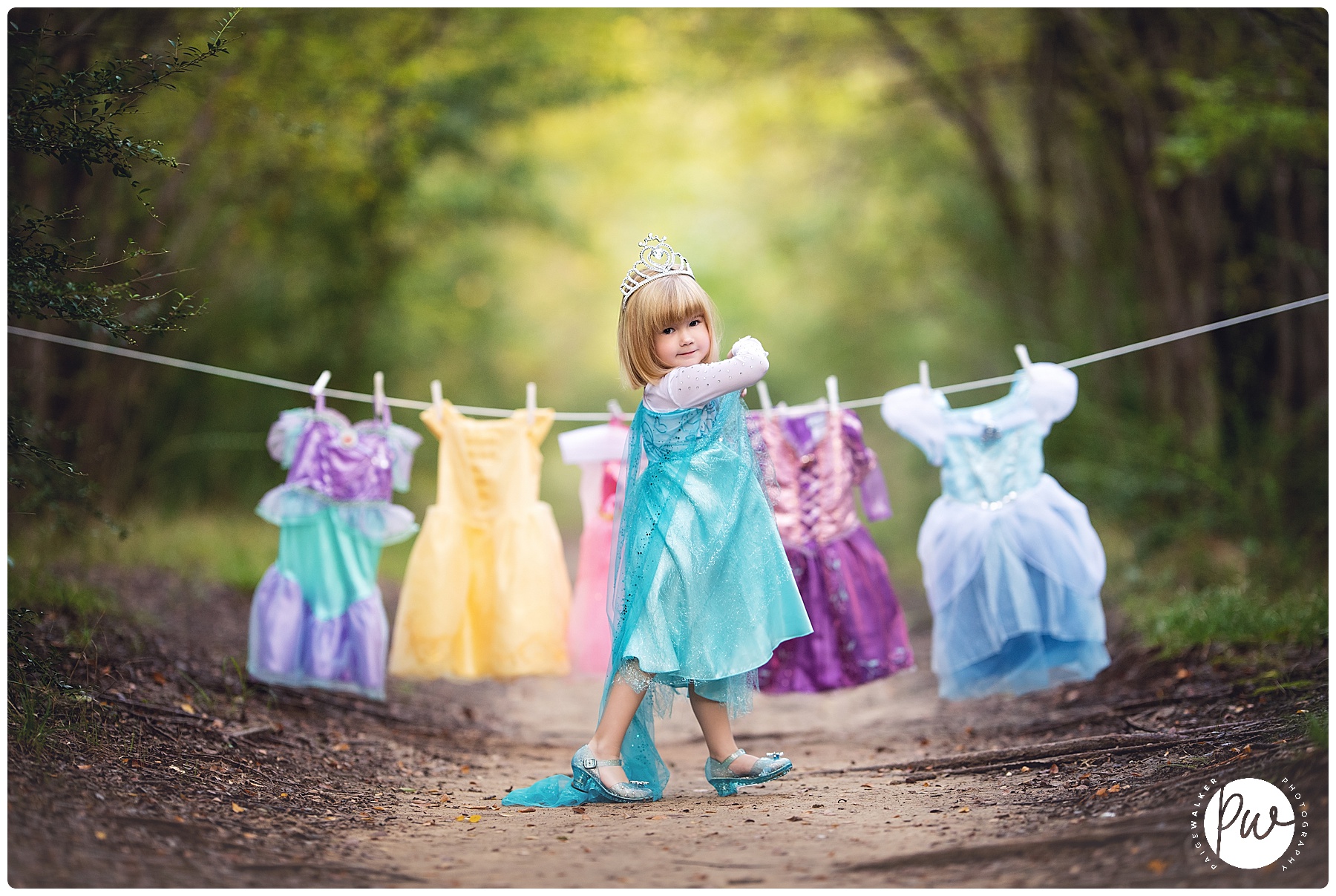 little girl standing with her princess clothes line