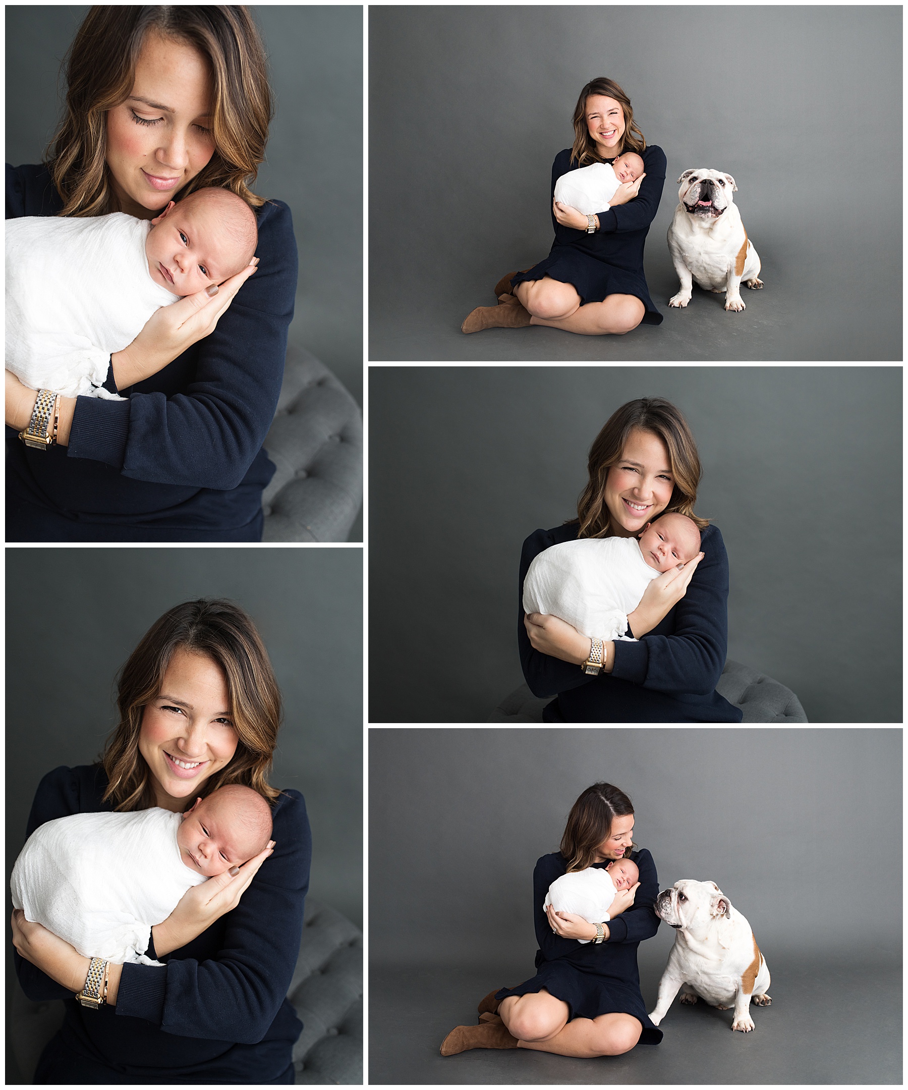 mom holding her newborn baby with her boxer dog in the studio