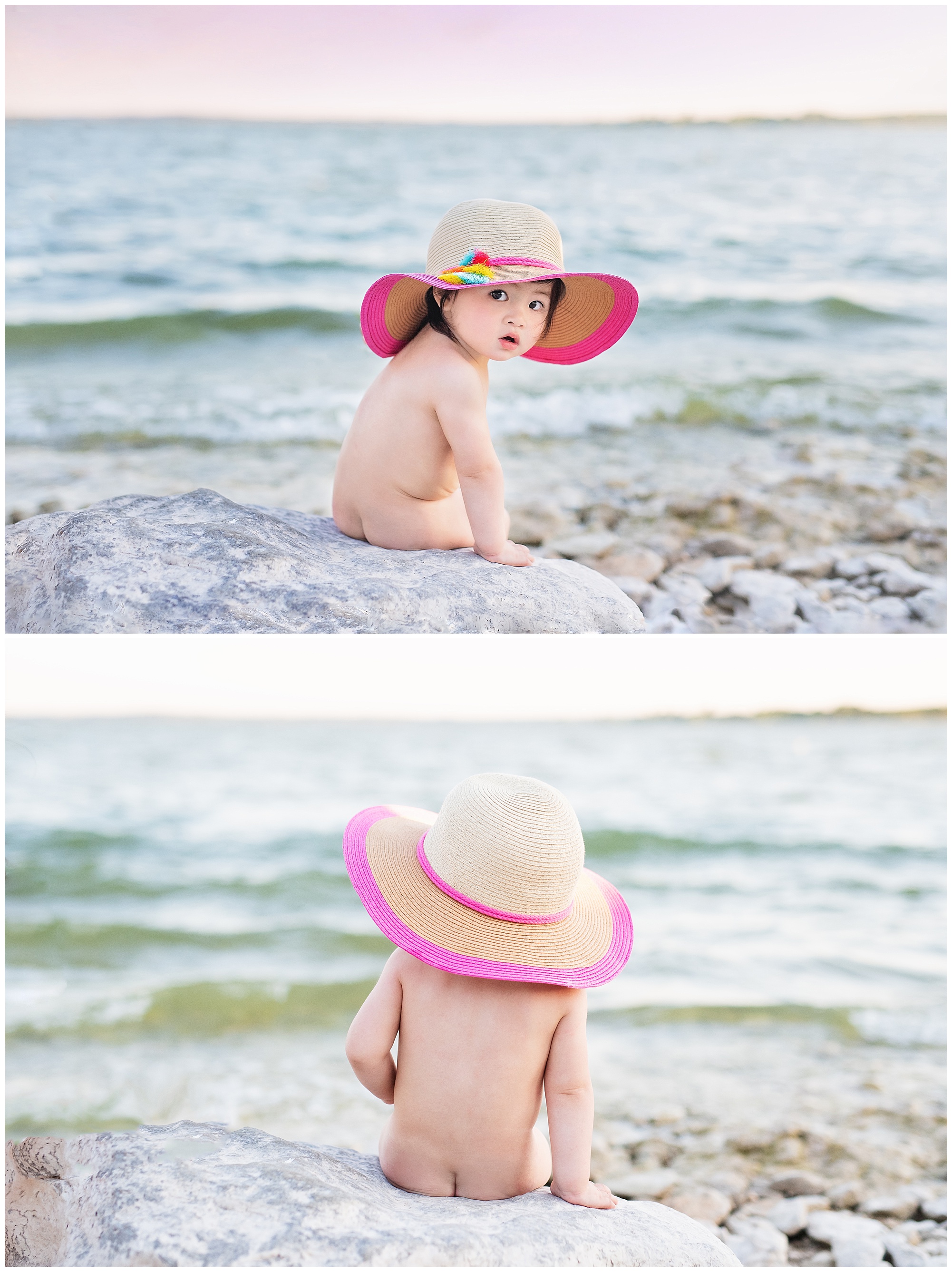 one year old sitting with her sun hat on the rocky beach