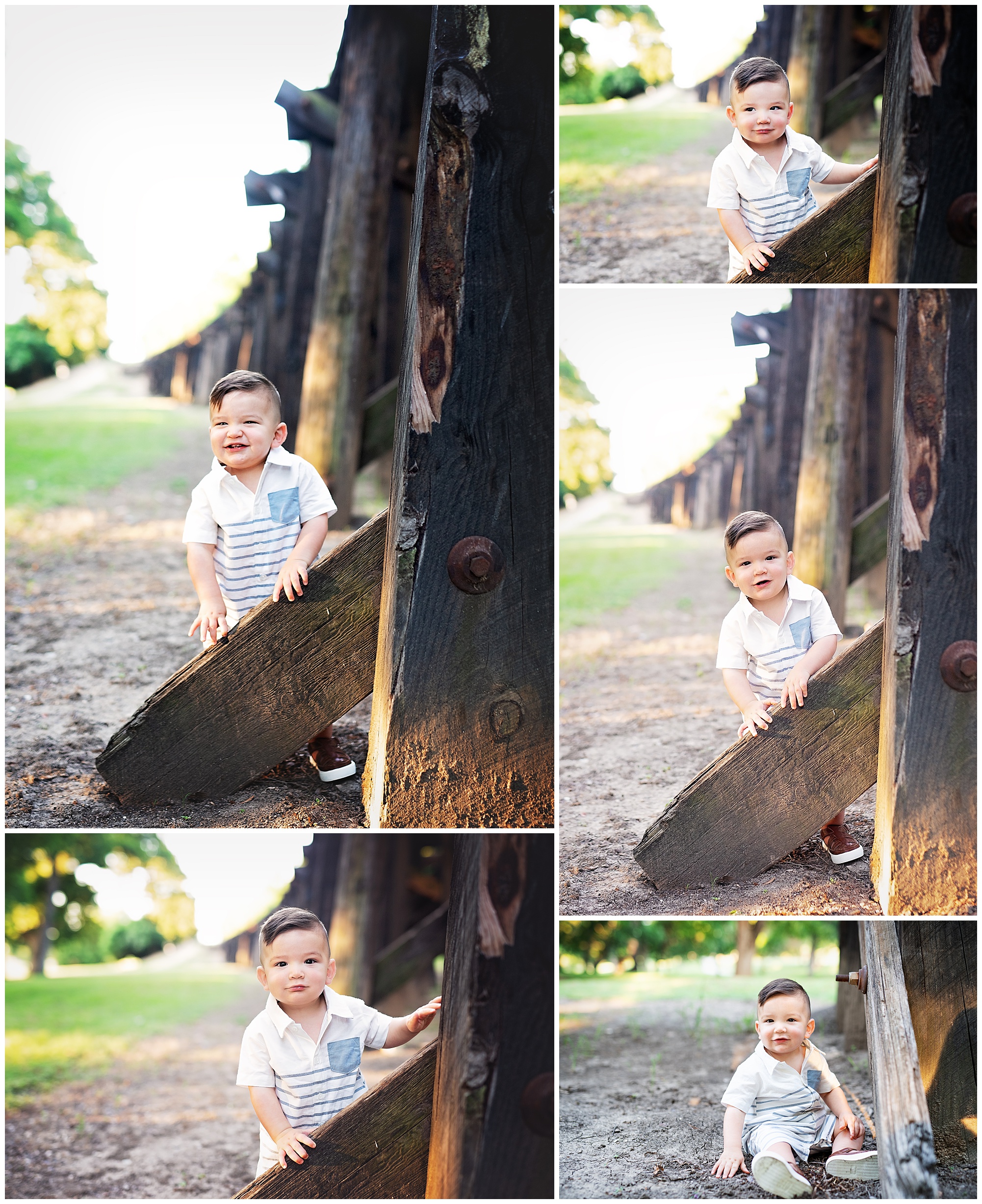 little boy smiling near a train track bridge