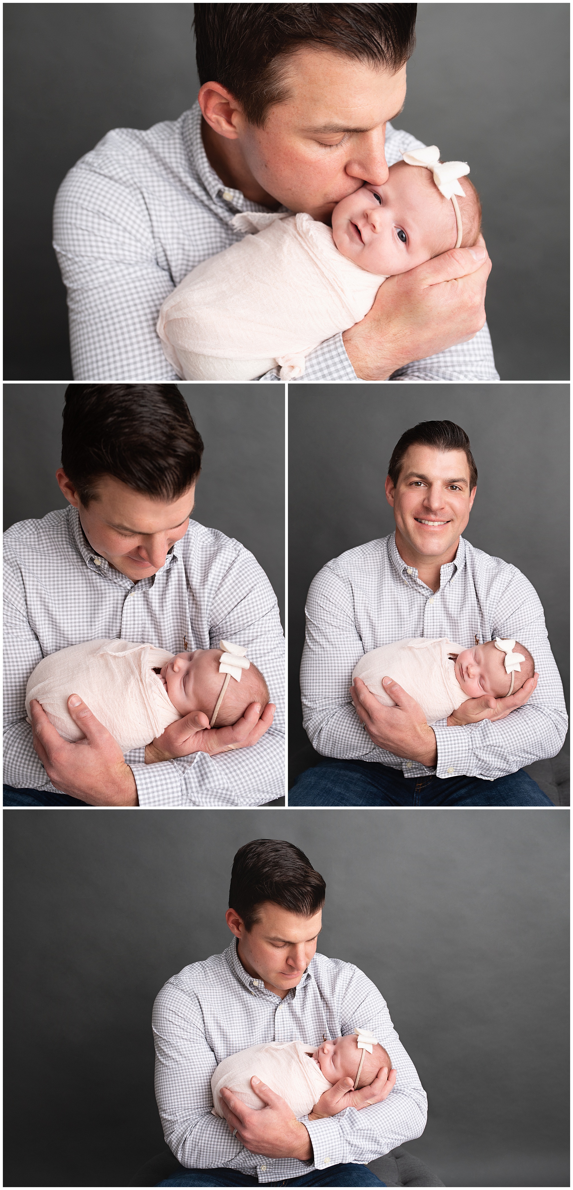 happy dad holding his newborn baby girl